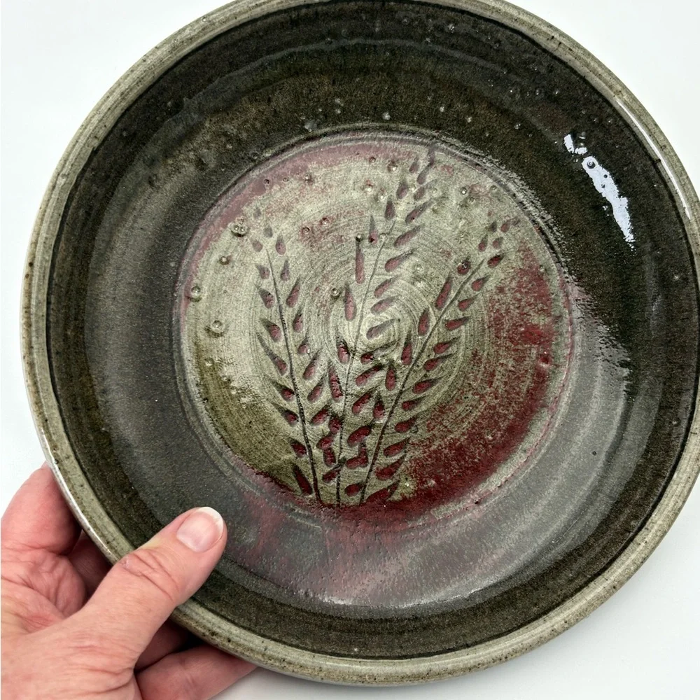 Signed Handcrafted Pottery  Plate with Dark Red Wheat Design on Gray-Green